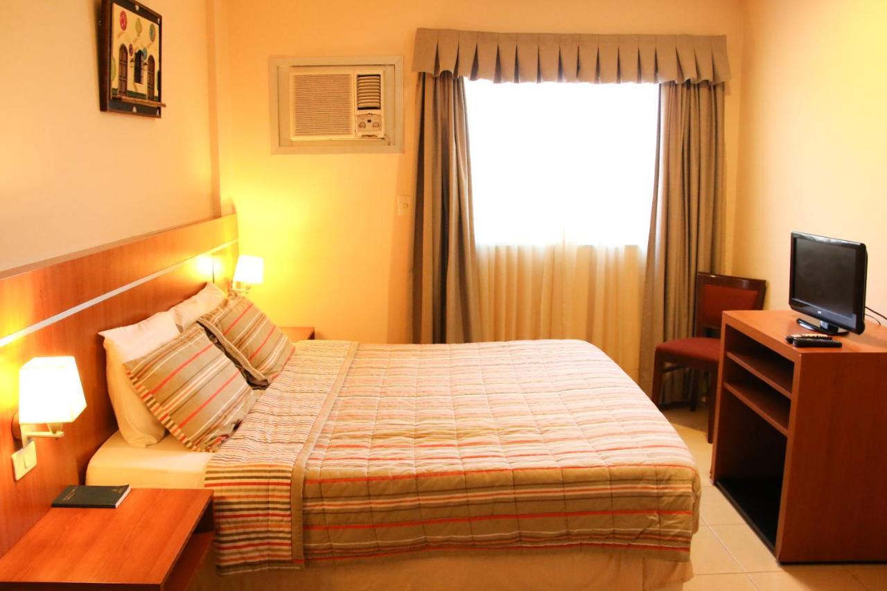 Olimpo Hotel & Suites Itauguá Extérieur photo