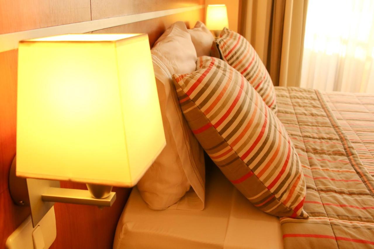 Olimpo Hotel & Suites Itauguá Extérieur photo